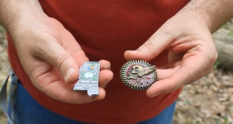 Two of only three Geocoins known to have flown in space